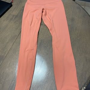Lulu leggings salmon color. Size 2. 24 inch inseam